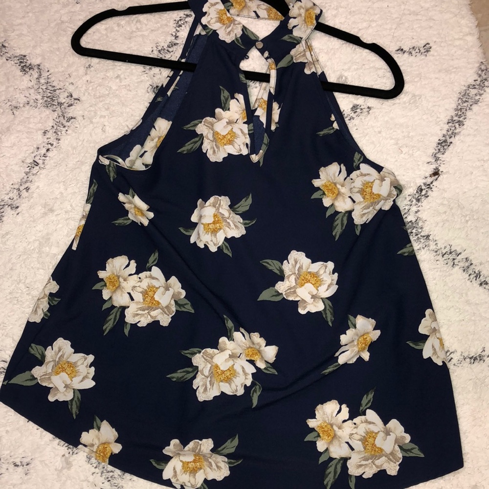 Floral and navy blue zey hole shirt